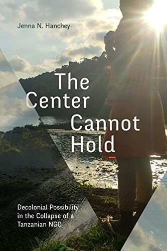 Book cover with title, author, and landscape featuring a person’s back.
