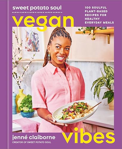 Cookbook cover featuring a smiling Black woman holding a plant-based meal.