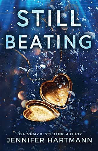 Book cover: "Still Beating" with an open heart-shaped locket on a blue, starry background.
