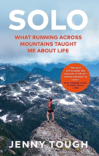 Book cover showing a hiker standing on a mountain peak overlooking a vast range.