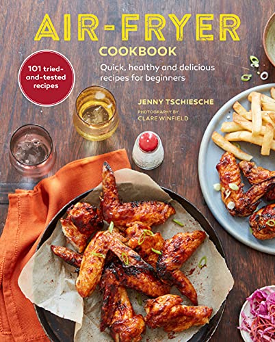 Cover of Air-fryer Cookbook showing chicken wings, fries, and a salad on a table.