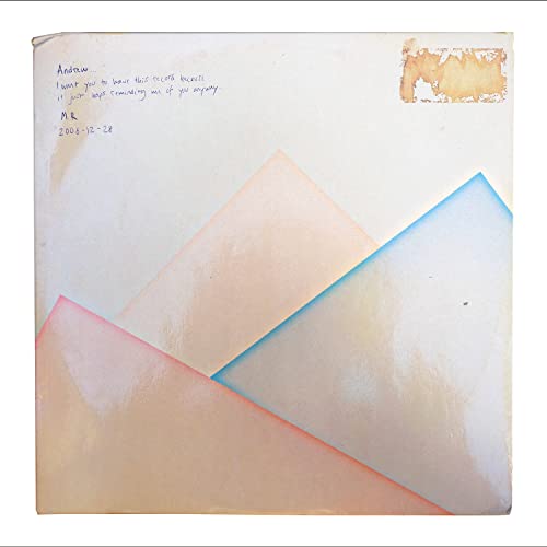 Vinyl cover with handwritten note and abstract pink and blue mountain shapes on white.