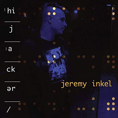 CD cover featuring a man’s profile with text and golden dots.