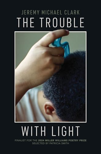 Book cover: hand combing textured hair, dark background, white text.