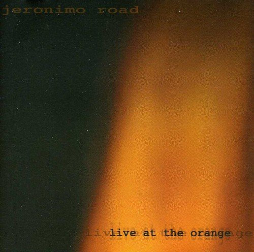 "Album cover with orange and black gradient background and typed text."