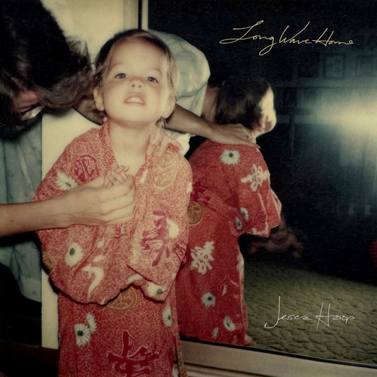 CD cover: vintage photo of a young girl in a floral dress.
