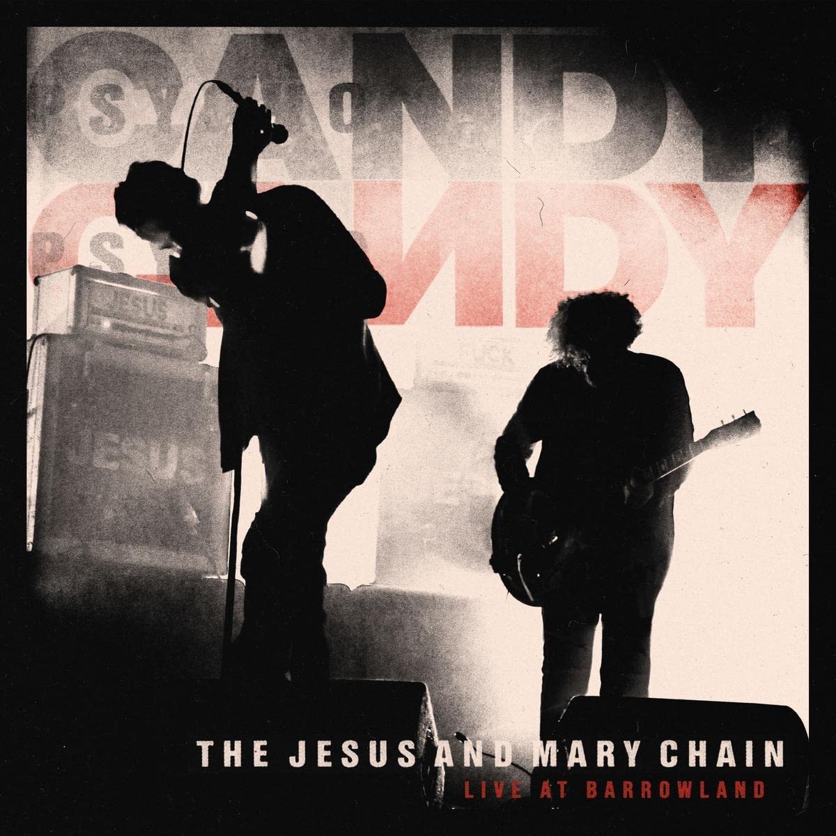 "Album cover featuring silhouettes of two musicians performing on stage."