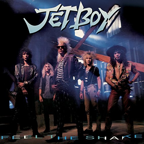 Album cover featuring five men in rock attire standing in front of a cross.