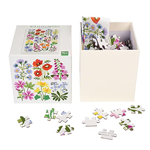 Wild Flowers jigsaw puzzle box with loose pieces on a white background.