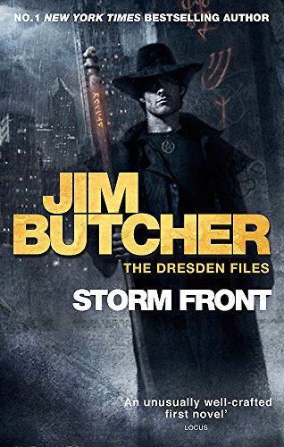 Book cover featuring a man in a hat holding a staff in a city.