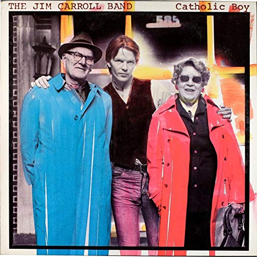 "Vinyl album cover featuring three men standing together, with colorful coats and attire."