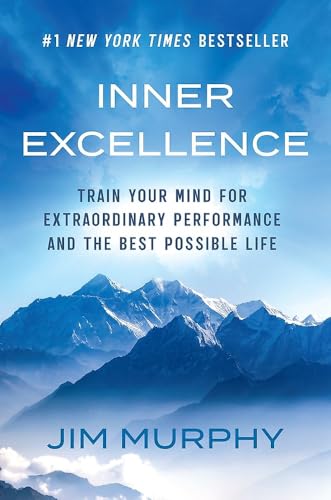 Book cover for "Inner Excellence" with a mountain range background.