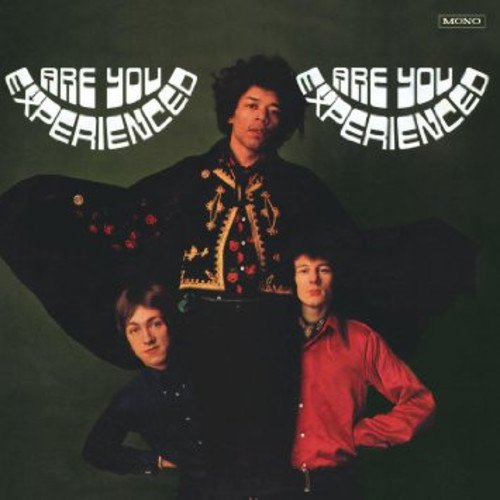 "Album cover featuring Jimi Hendrix and two band members against a dark green background."