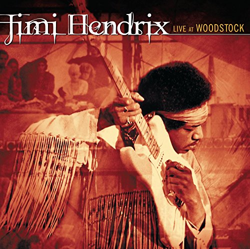 Jimi Hendrix playing a white electric guitar at Woodstock, CD cover.