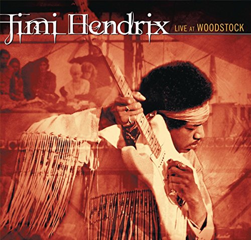 Jimi Hendrix playing a white electric guitar at Woodstock, album cover.