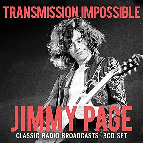 Black and white photo of Jimmy Page playing an electric guitar.