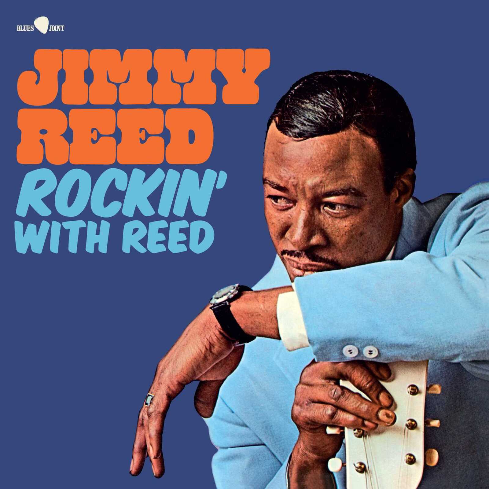 Jimmy Reed album cover: portrait of musician with guitar, orange text.