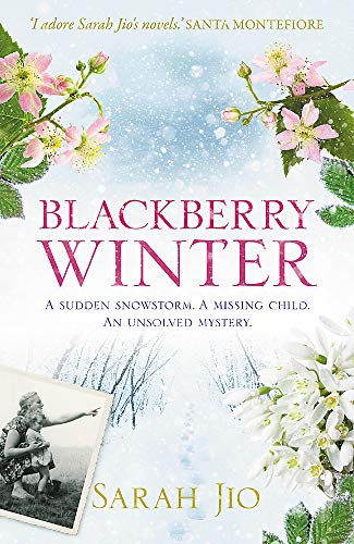 Book cover for “Blackberry Winter” with floral accents and a snowy scene.