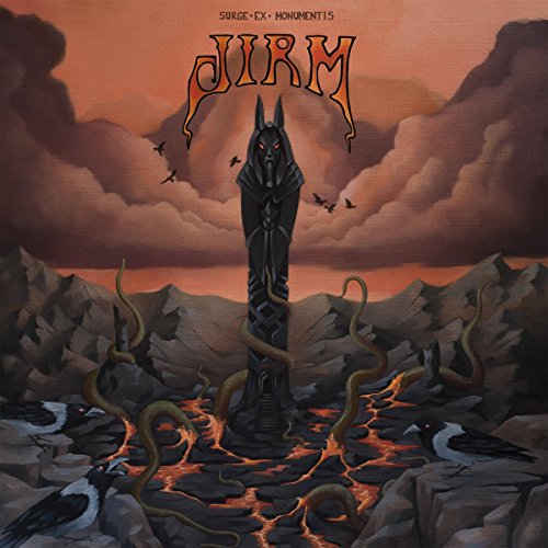 Album cover: Anubis statue amidst a fiery, mountainous landscape with birds.