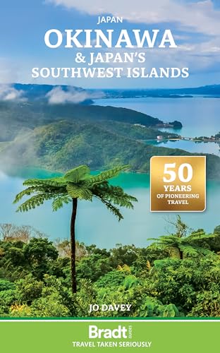 Travel guidebook cover featuring lush green islands and turquoise water.