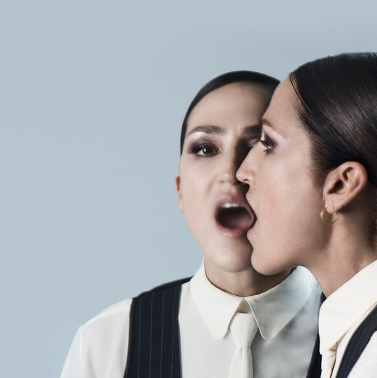 Joan As Police Woman album cover with a mirrored, expressive portrait.