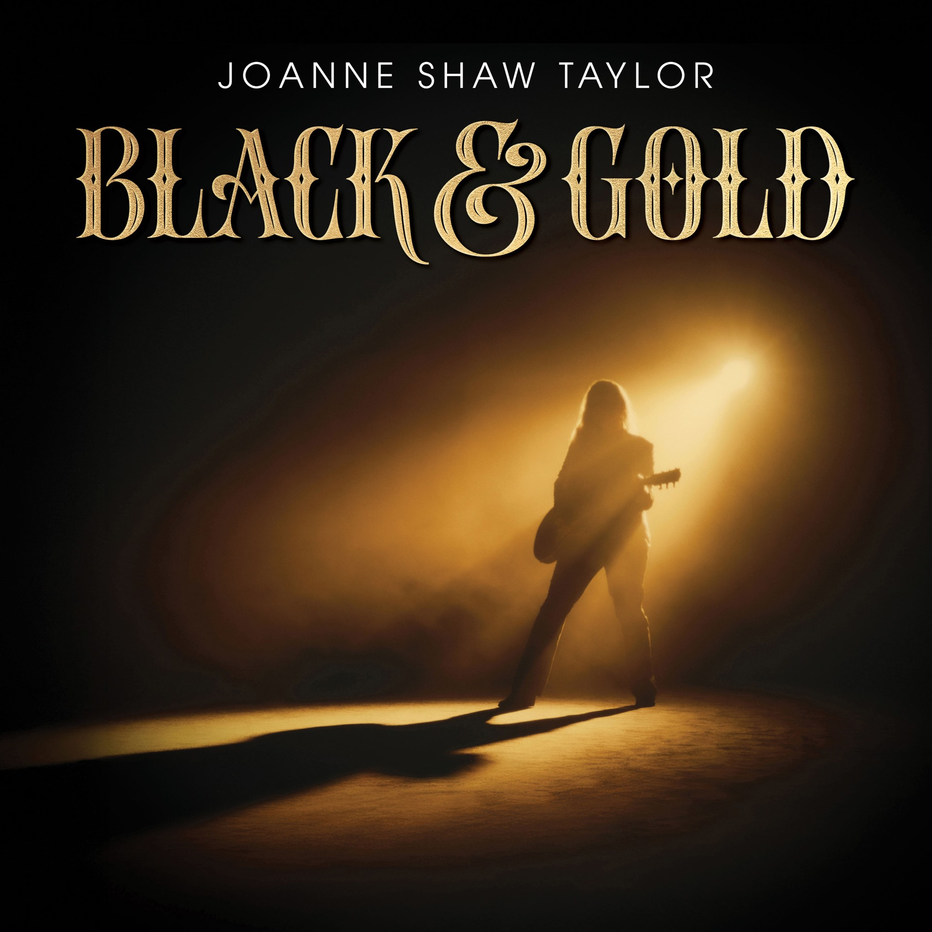 Joanne Shaw Taylor album cover, silhouette of a guitarist in gold light.
