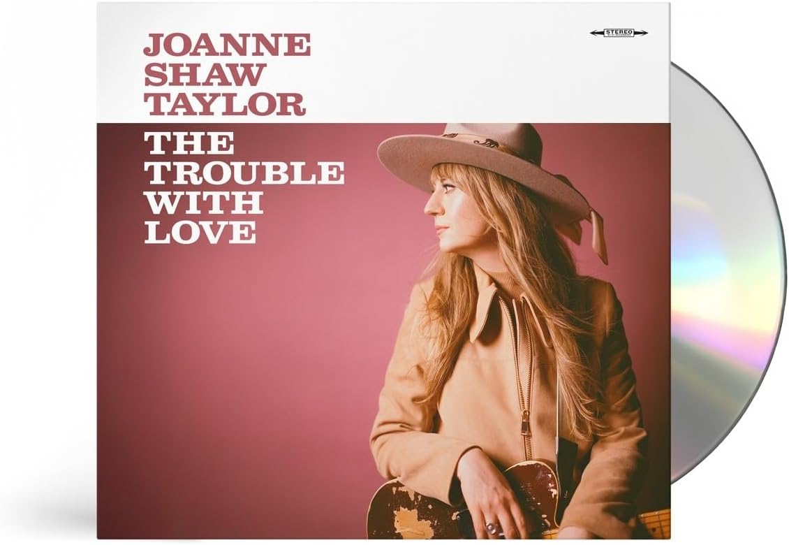 CD cover for Joanne Shaw Taylor’s “The Trouble With Love,” featuring a portrait.