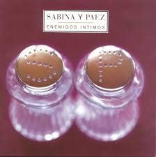 Album cover: two clear salt and pepper shakers on a red background.