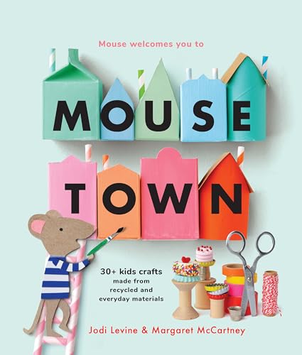 Book cover for "Mousetown" featuring colorful cardboard houses and a mouse painter.