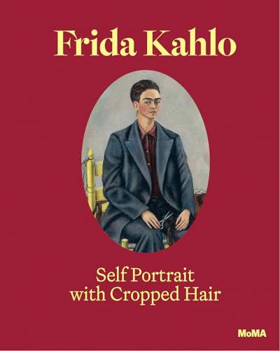 Frida Kahlo in a suit, holding scissors, with cropped hair.