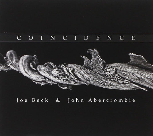 CD cover for "Coincidence" by Joe Beck & John Abercrombie, abstract design.