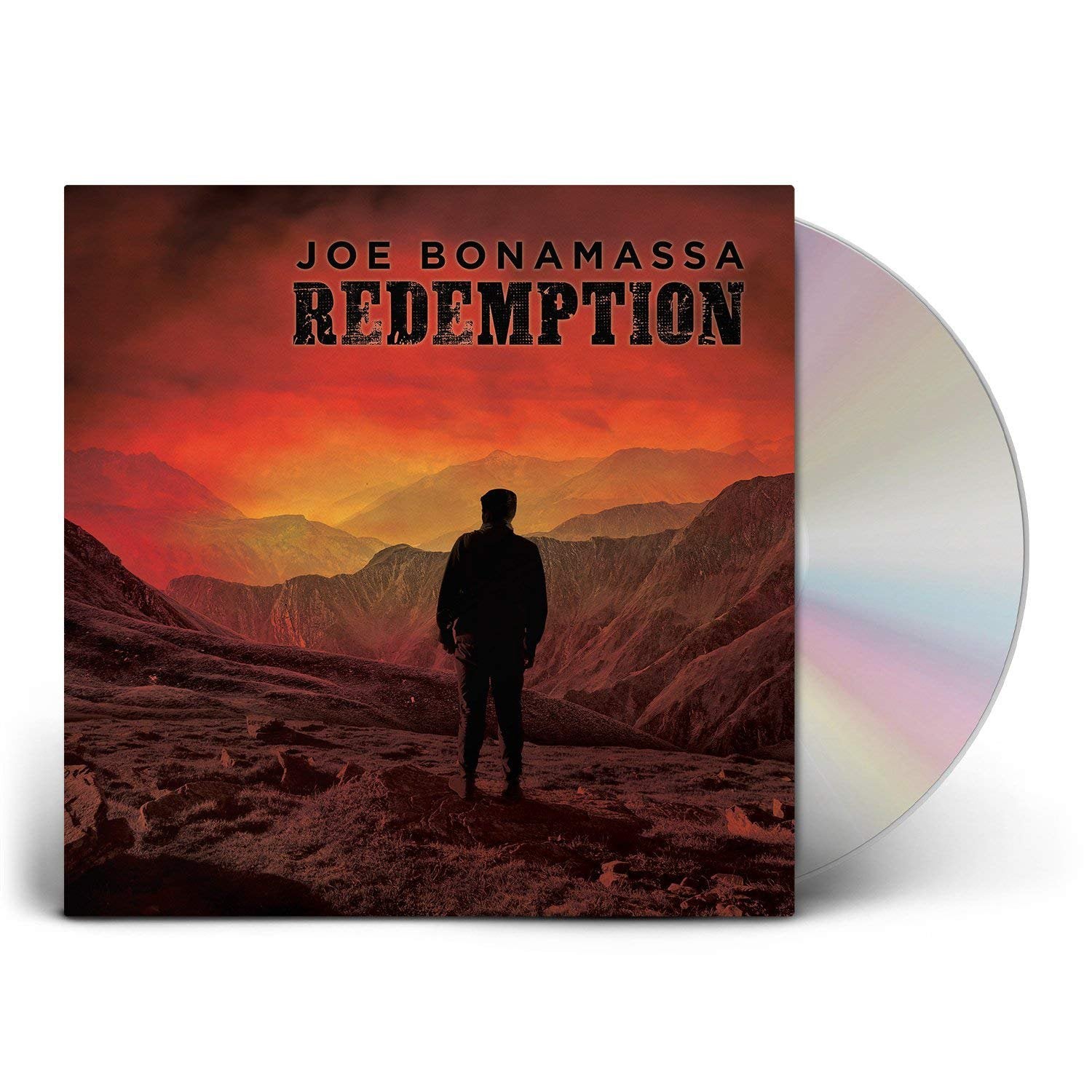 "Album cover with a man standing in a red mountain landscape, titled 'Redemption'."