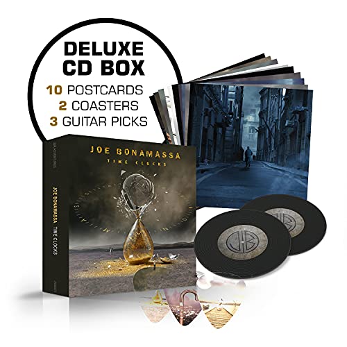 Joe Bonamassa “Time Clocks” deluxe CD box set with extras displayed.