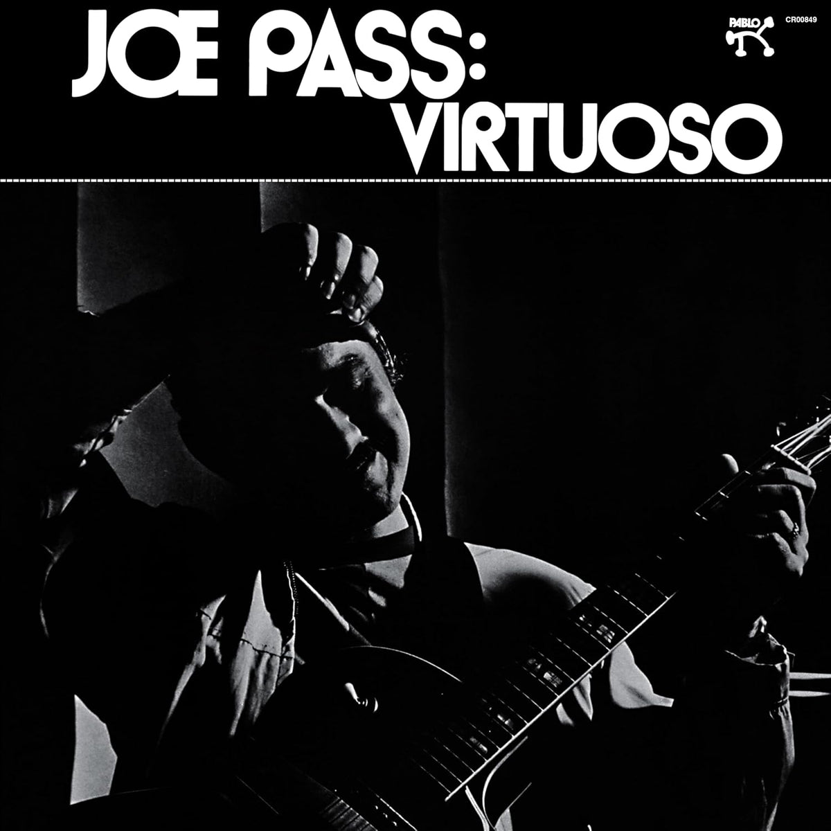 Black and white album cover featuring jazz guitarist Joe Pass.
