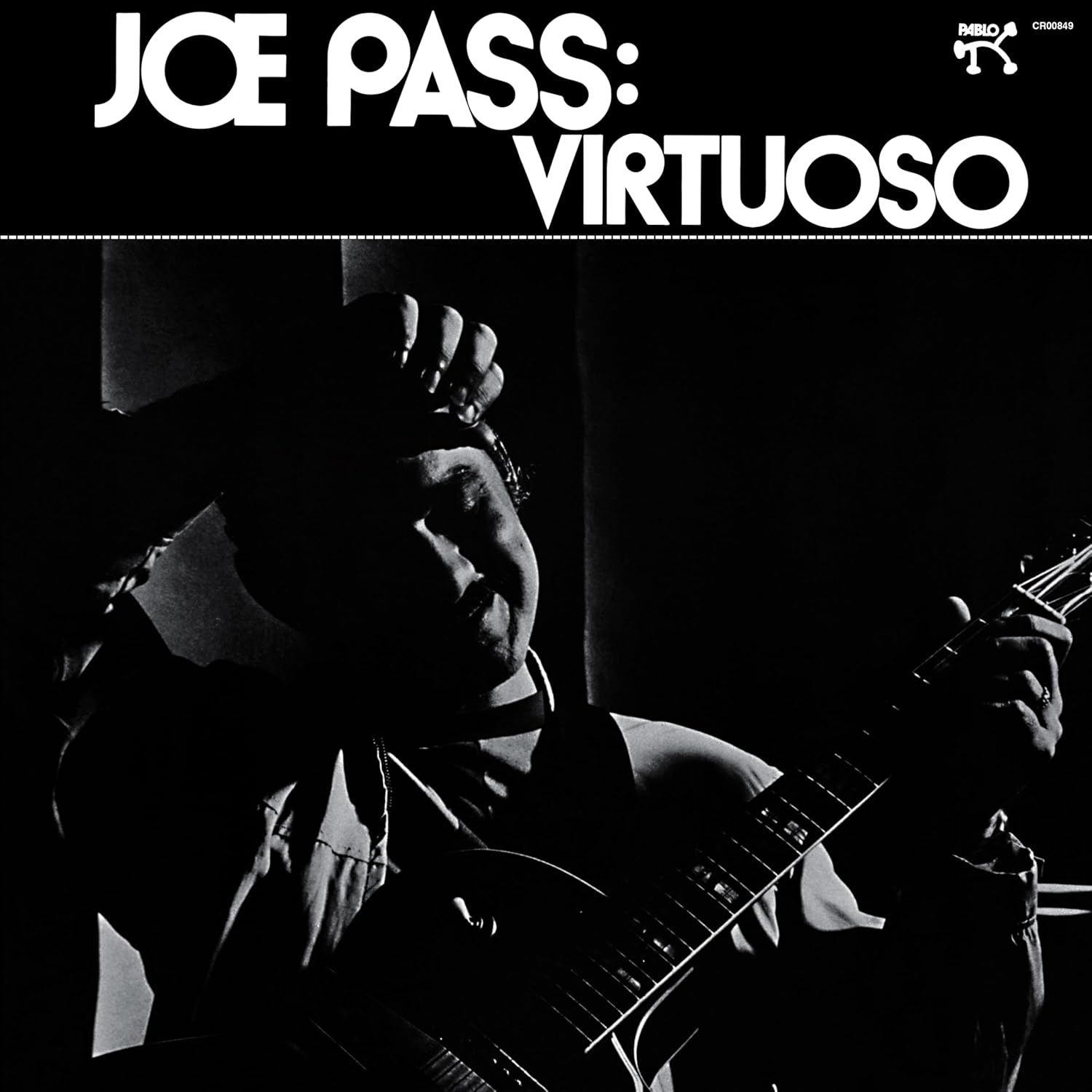 Black and white album cover featuring jazz guitarist Joe Pass.