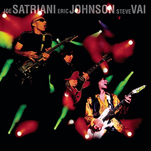 Three guitarists—Satriani, Johnson, and Vai—performing on a dark stage.