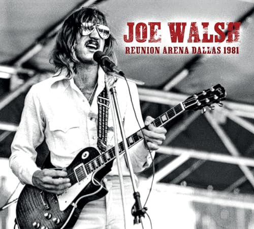 Black and white photo of Joe Walsh playing guitar onstage in 1981.
