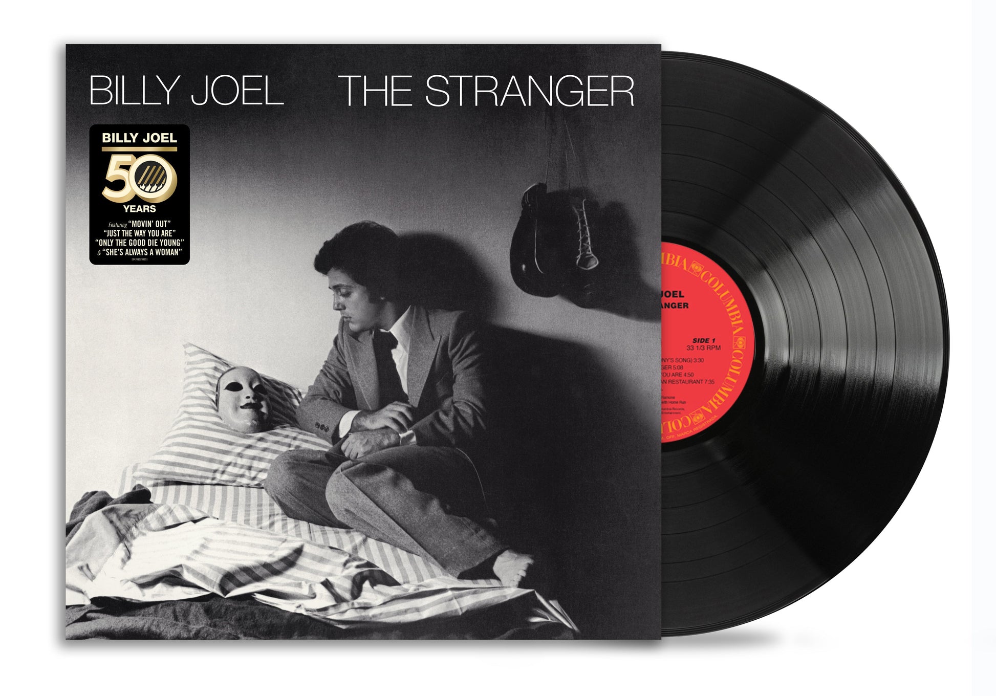Billy Joel's "The Stranger" vinyl record with a portrait cover.