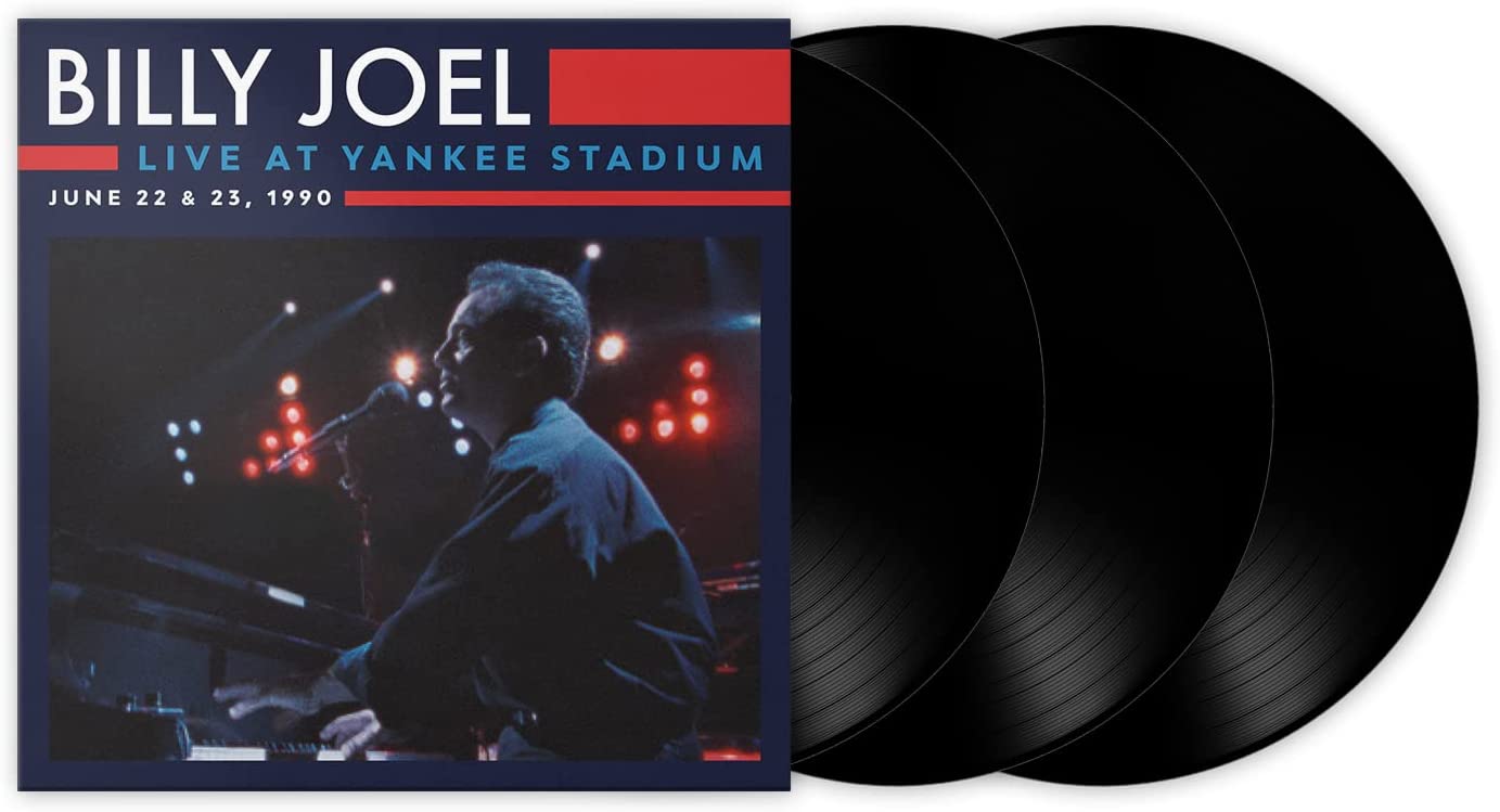 Billy Joel vinyl album cover featuring the artist singing into a microphone on stage.