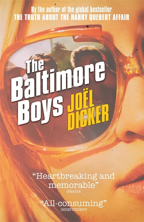 Book cover: "The Baltimore Boys" by Joël Dicker, featuring reflected faces.