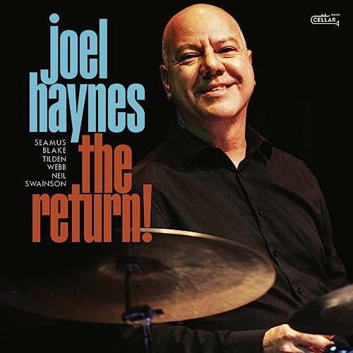 CD cover featuring drummer Joel Haynes smiling, with text and cymbals.