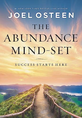 Book cover with title "The Abundance Mind-Set" and a path to a mountaintop.