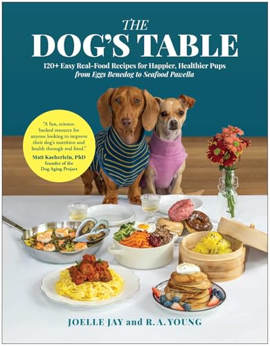 Cookbook cover featuring two dogs and prepared food dishes.