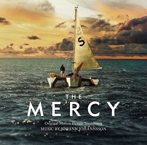 Sailboat on ocean under stormy sky, album cover for "The Mercy" soundtrack.