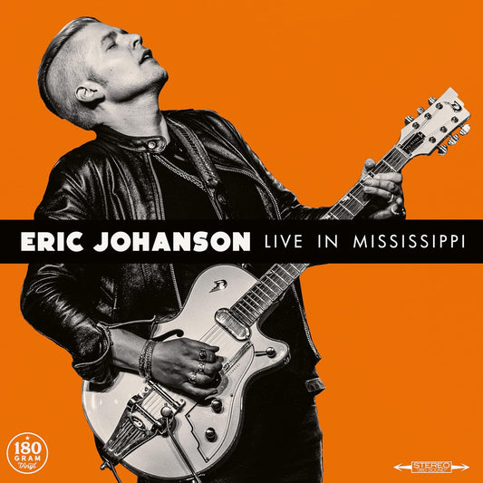 Eric Johanson album cover: musician with guitar, black and white portrait.