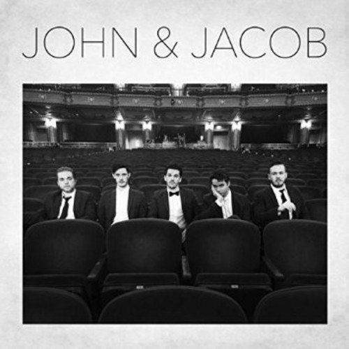 "Album cover with five men in suits in an empty theater, black and white image."