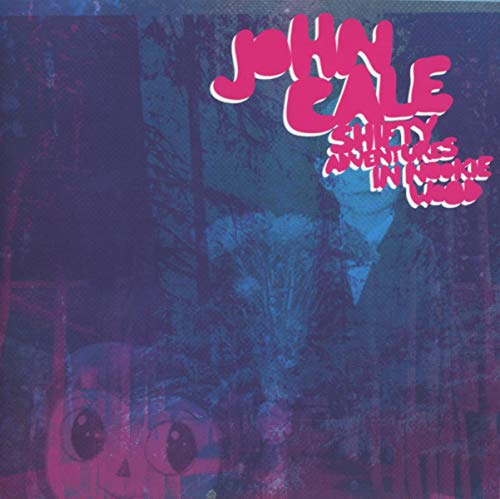 John Cale album cover: abstract blue forest with red text and eyes.