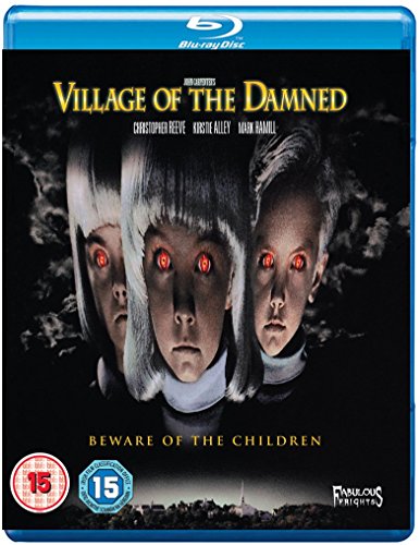 Blu-ray cover for "Village Of The Damned" featuring three pale children with red eyes.