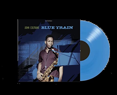 John Coltrane Blue Train album cover next to a blue vinyl record.