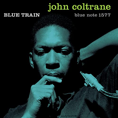 Album cover featuring a teal-toned portrait of John Coltrane holding a saxophone.